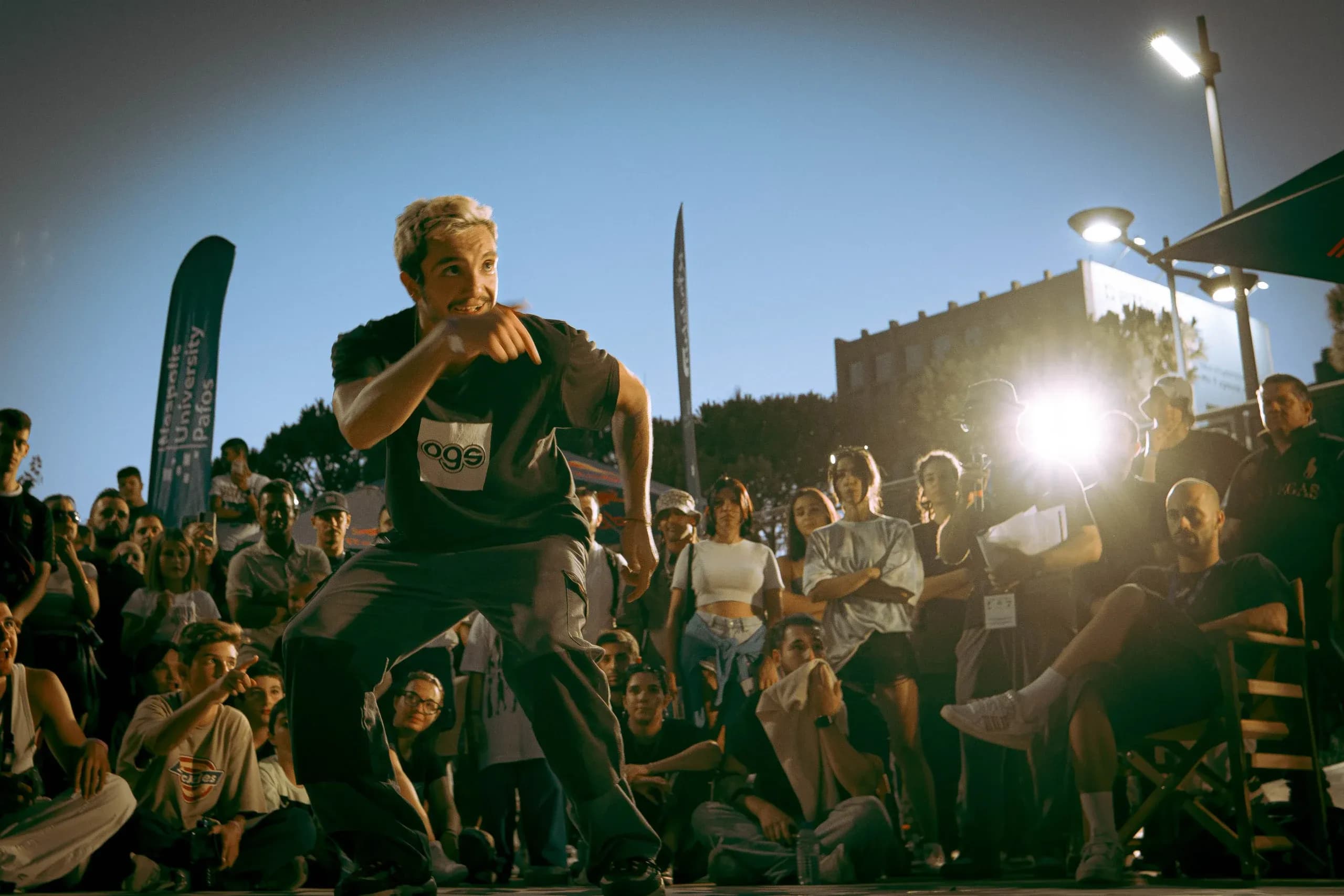 Breakdancer performing at sunset